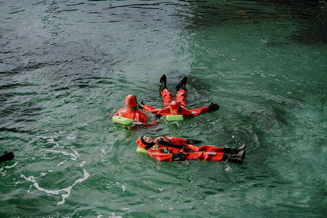 2 Hours Urban Arctic Floating Activity in the Harbours of Tromsø - Getting dressed for 34-degree water