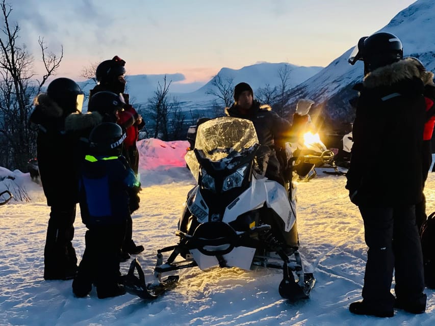Abisko/Björkliden: Panorama Snowmobile Tour with Snacks - Climbing toward Čuonjávággi and Torneträsk