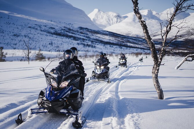 Adventure Snowmobile Safari - Sharing a snowmobile with another person