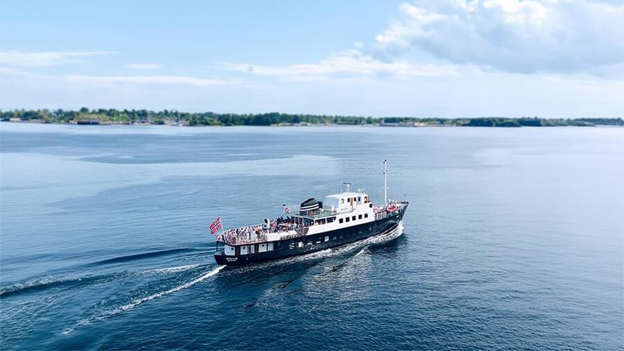 All About the Fjords, in one tour by boat & bus from Ålesund - The Storfjord ferry at Magerholm