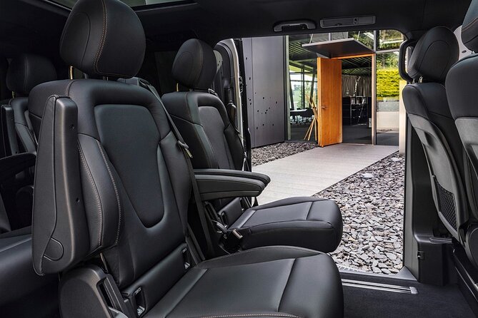 Arrival Private Transfer from Bergen Airport BGO to Bergen by luxury minivan - Meeting your chauffeur at Bergen Airport