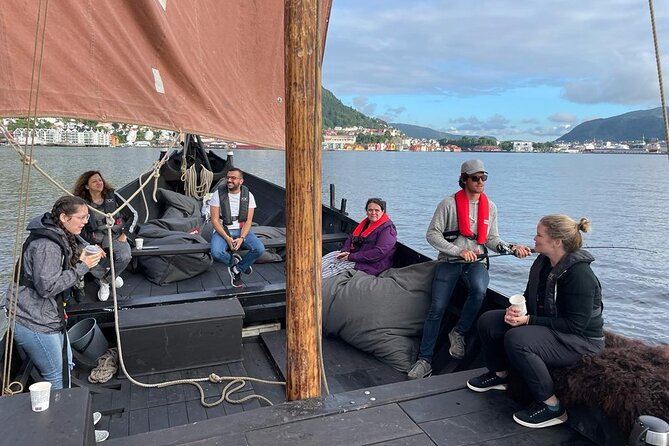 Bergen Fjord Experience Aboard Viking-style Ship - Fishing, steering, and raising the sail