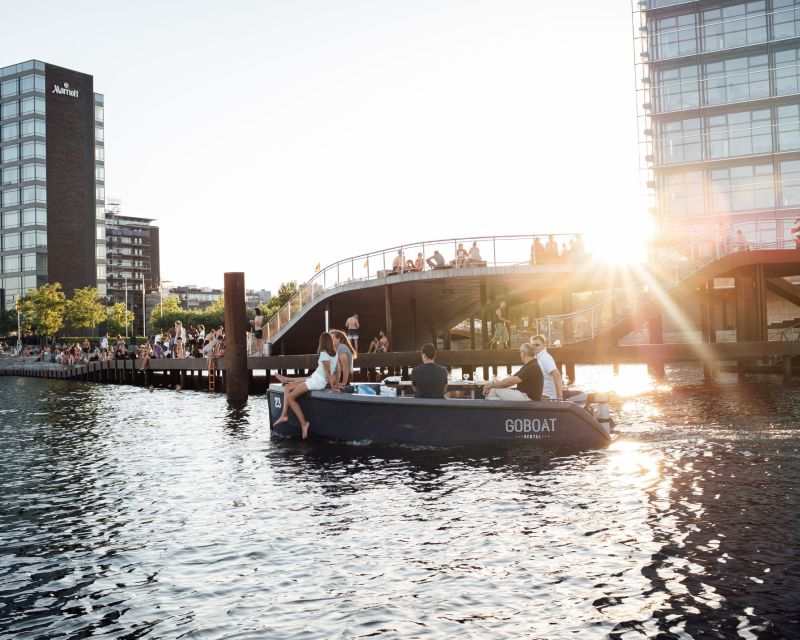 Copenhagen: 1, 2 or 3-Hour Boat Rental (No License Required) - Taking the wheel at Islands Brygge 10