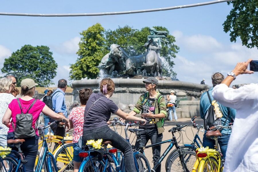 Copenhagen: Highlights 3 Hour Bike Tour with a Local Guide - Rådhuspladsen and Tivoli: a quick city orientation