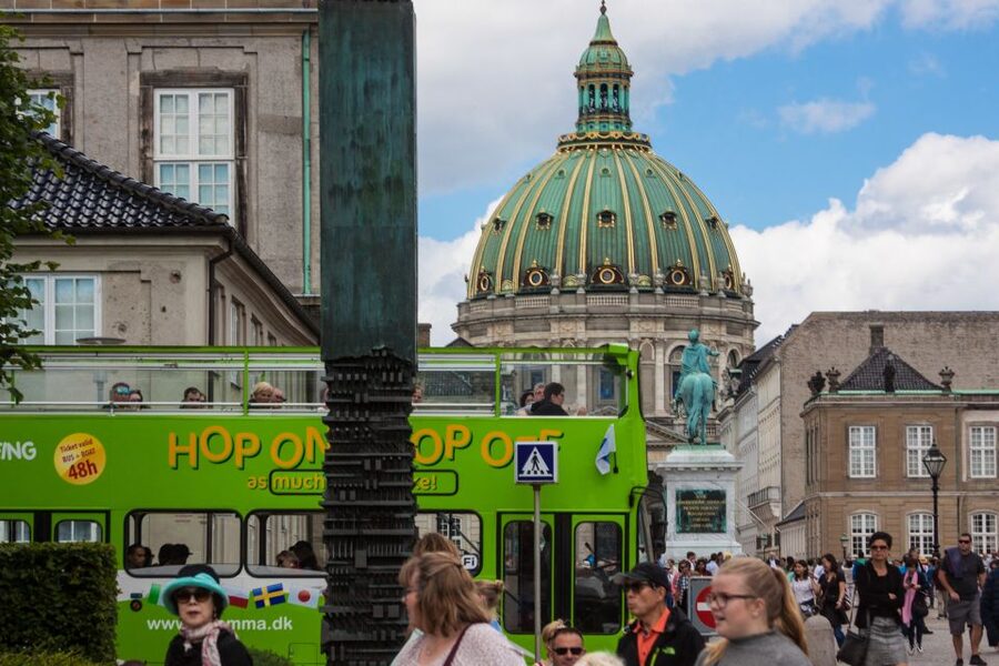 Copenhagen: Hop-On Hop-Off Bus Tour with Audio Guide - Take the red Classic Copenhagen route first