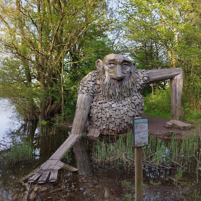Copenhagen: Six Forgotten Giant Sculptures Tour by Bus - Sleeping Louis begins the hunt