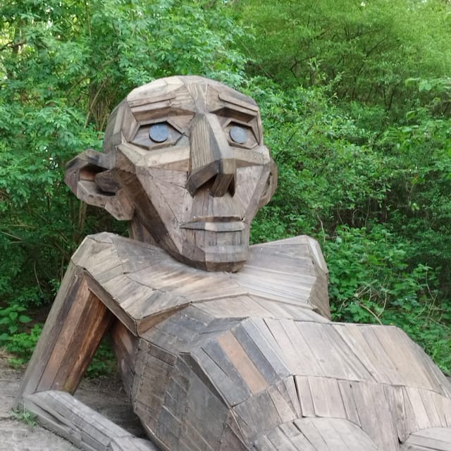 Copenhagen: Six Forgotten Giant Sculptures Tour by Bus - Hilltop Trine adds a change of setting