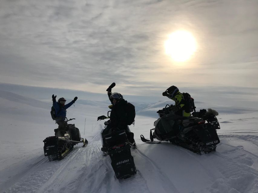From Tromso: Arctic Wilderness Snowmobile Daytime Tour - Meeting the coach at Magic Ice Bar