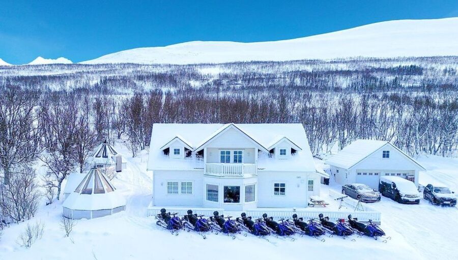 From Tromsø: Lyngen Alps Guided Snowmobile Tour - Arriving, gearing up, and learning the machine