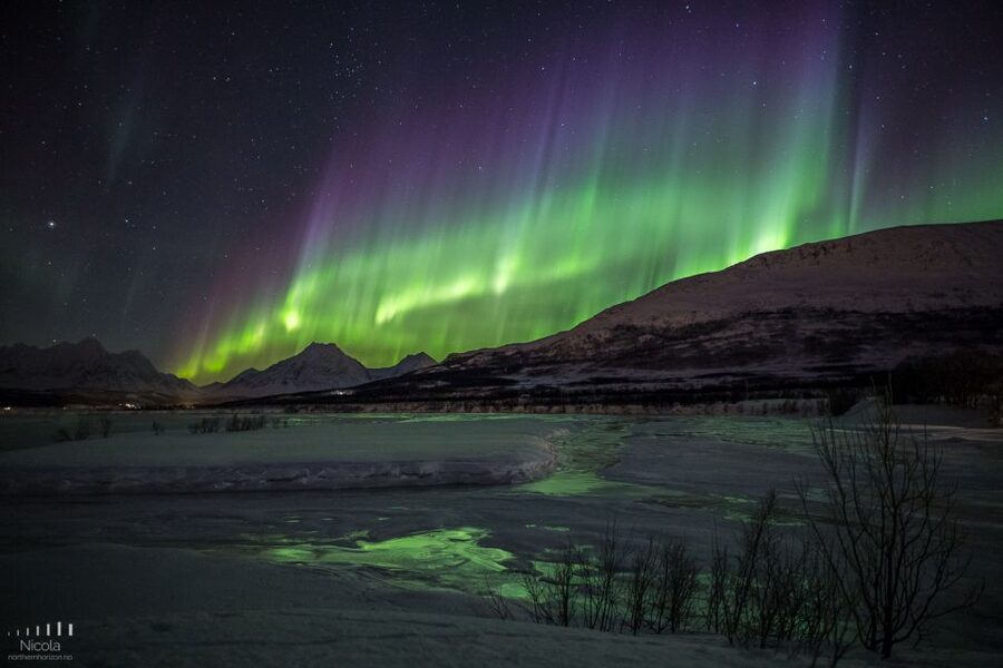 From Tromsø: Northern Lights Tour - The bonfire meal and supplied winter gear