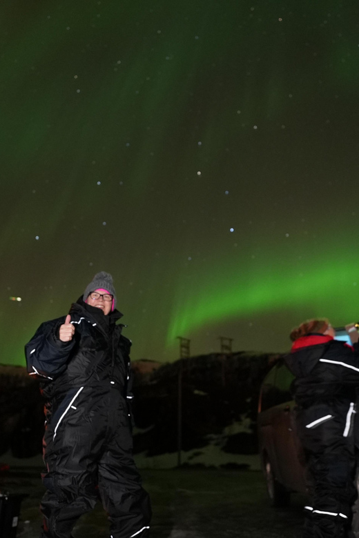 From Tromsø: Northern Lights Tour with Hot Drinks and Photos - Leaving central Tromsø in a 15-seat minibus
