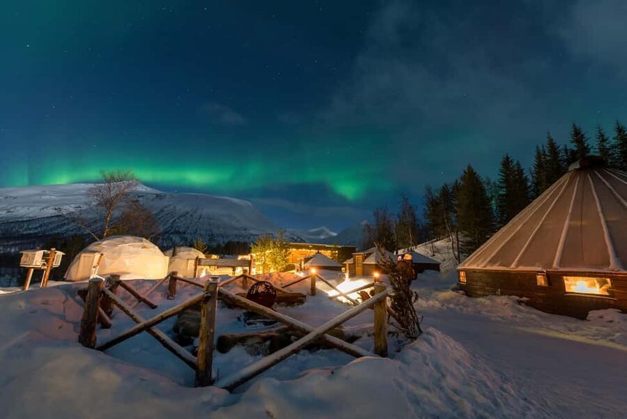 From Tromsø: Northern Lights Visit at Camp Tamok - Getting suited up for Arctic weather