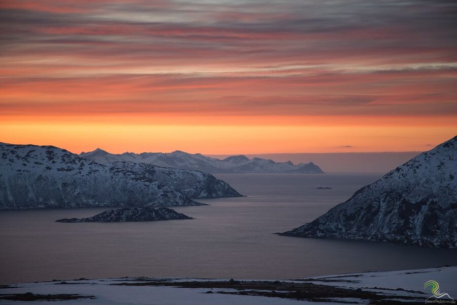 From Tromso: Norwegian Fjords Half-Day Tour - Walking the cold sandy beaches