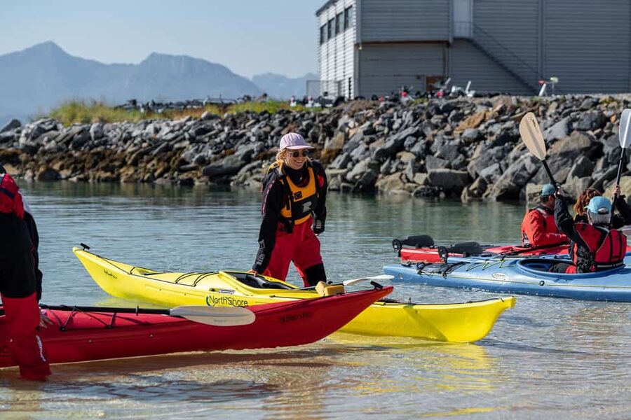 From Tromsø: Sea Kayaking Tour at Sommarøy with Transfer - Getting suited up for cold Arctic water