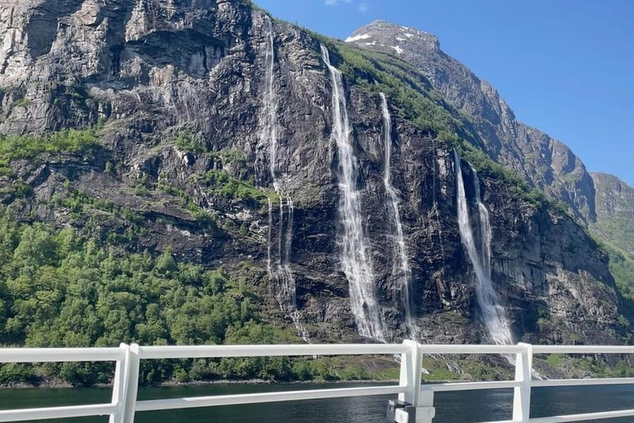 Geiranger Fjord Boat Tour with Waterfall Tasting - The outward cruise toward the Seven Sisters