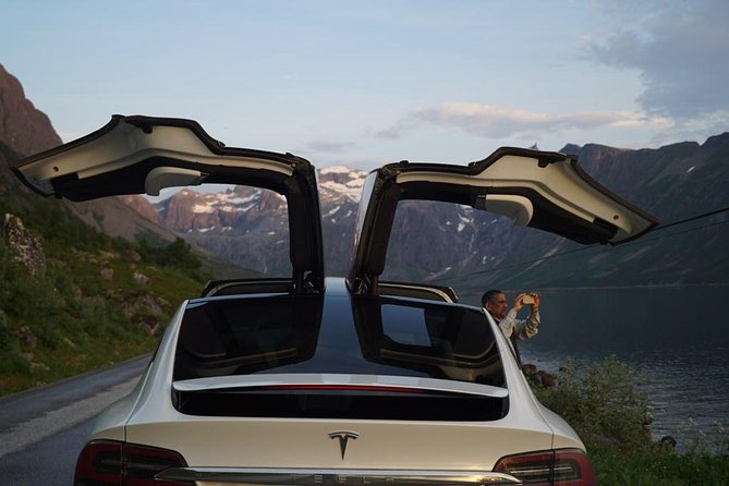 Midnightsun- Eco friendly Tesla Model X - The fjord route, islands, and mountain views