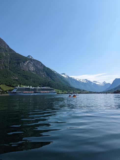 Olden: Guided beginner friendly fjord kayaking.Local company - The First 20 Minutes: Safety Before Scenery