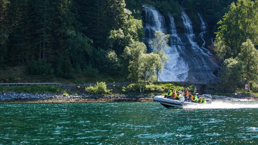 Olden: Nordfjord RIB Boat Tour with Live Commentary - Leaving Olden beside the cruise dock