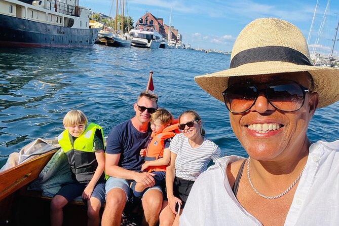 Private Copenhagen Boat cruise in Scandinavian mahogany boat - Christianshavn and the houseboat views