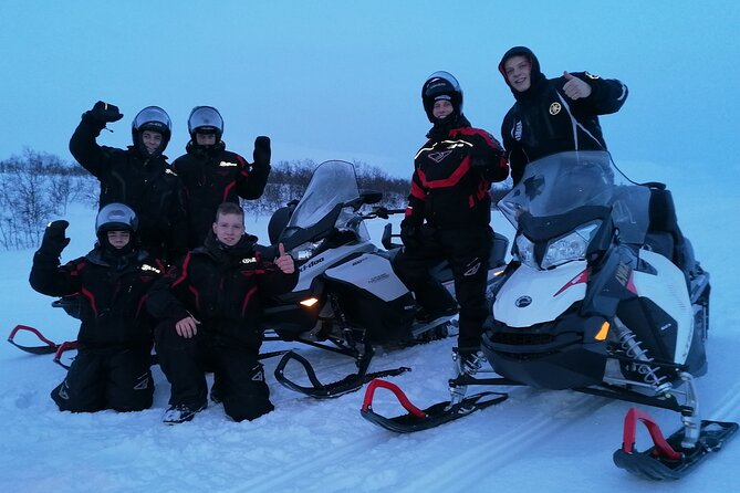 Snowmobile safari in the mountain plateau of Finnmarksvidda - Riding across the plateau
