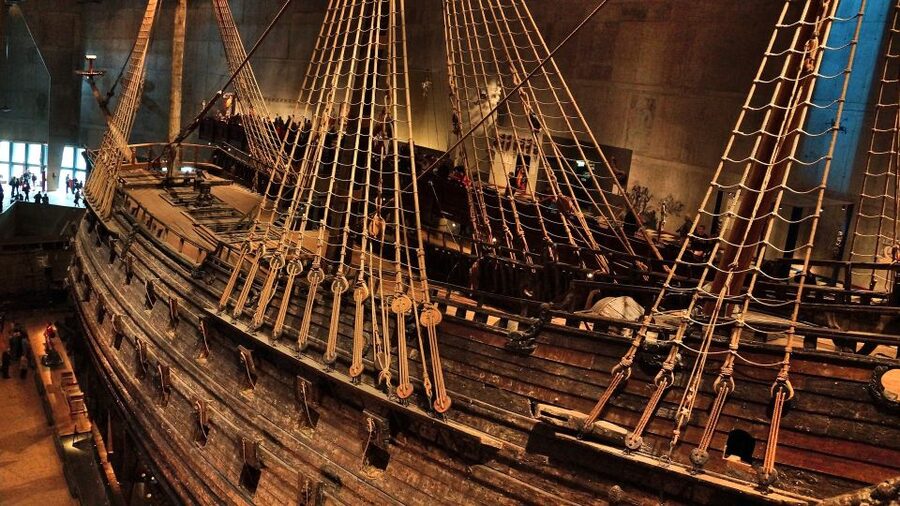 Stockholm: Old Town Walking Tour w/ Vasa Museum & Boat Ride - Stortorget, the Royal Palace, and the Old Town Runestone