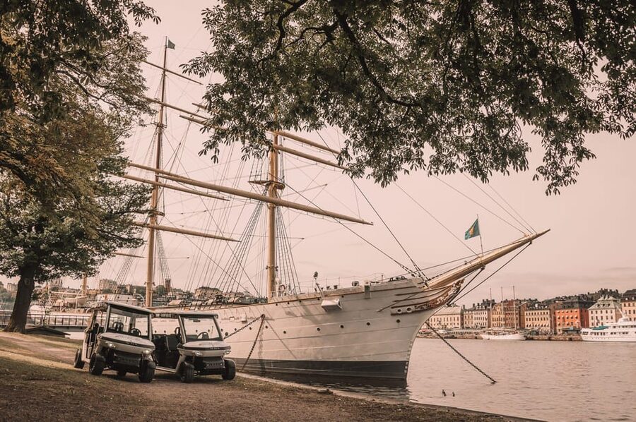 Stockholm Private Golf Cart Tours - Norrmalmstorg links shopping, politics, and popular culture