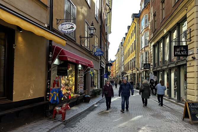 Stockholm Small Group Food Tour with 7 Classic Food Tastings - Drottninggatan turns the walk toward central Stockholm