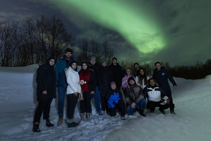 Tromsø: Aurora Borealis, Campfire, Hot Meal, Arctic Tour - Getting photographs under the aurora