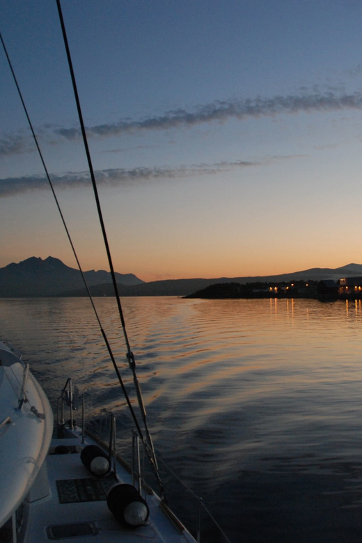 Tromsø: Fjord and Islands Luxury Catamaran Cruise - Fjord views, mountain country, and local stories