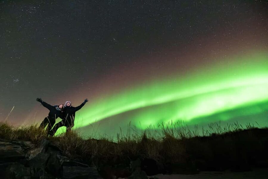 Tromsø: Northern Lights Chase by a comfortable bus - At the Magic Ice Bar Meeting Point