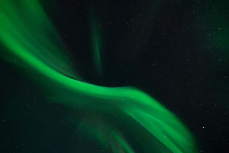 Tromsø: Northern Lights Focus Tour, German/English, minibus, meal - Searching for a clear sky across Troms County