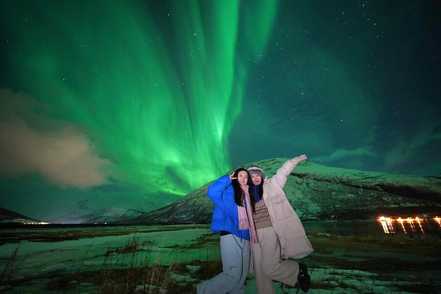 Tromso: Northern Lights Minibus Tour with Campfire - Leaving Tromsø in search of darker skies