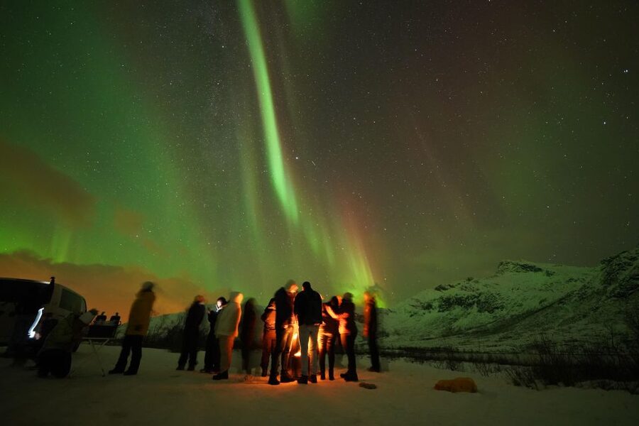 Tromsø: Northern Lights Tour with Free Professional Portrait - Settling beside the campfire