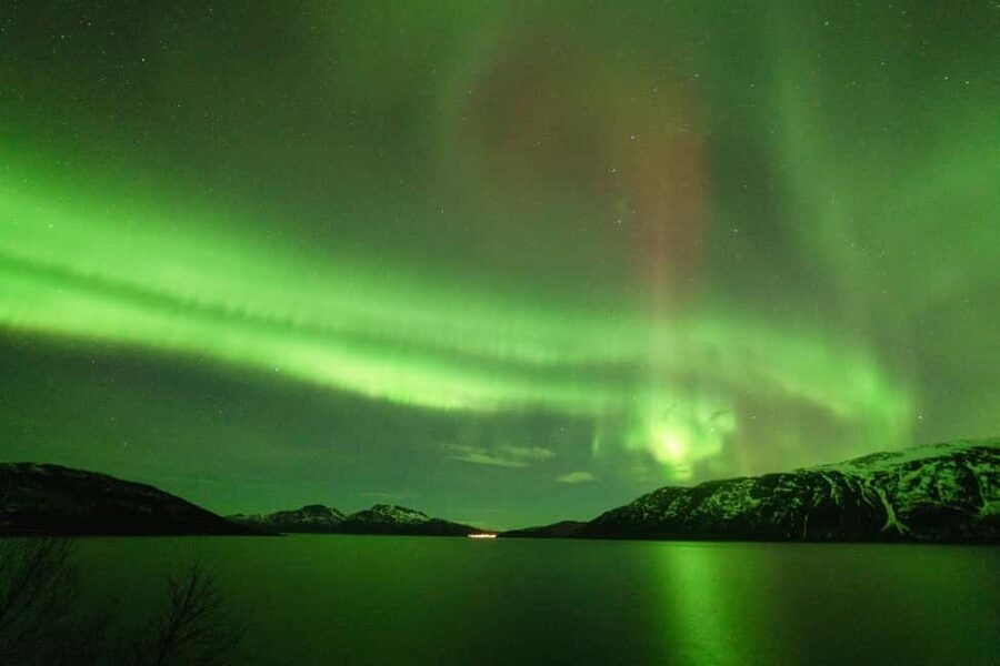 Tromsø: Northern Lights tour with local experts - The minibus ride through Tromsø’s winter darkness
