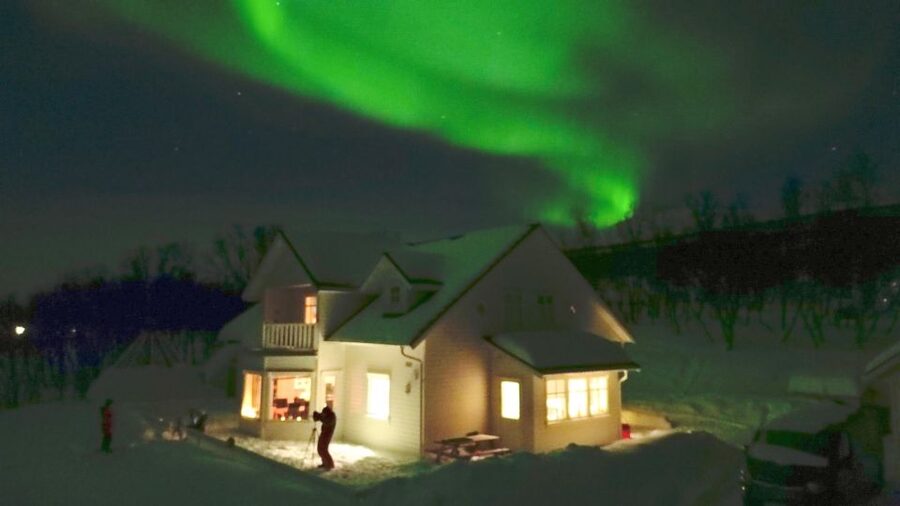 Tromsø: Snowmobile Safari with Aurora Crystal Lavvo Stay - Riding through the Lyngen Alps