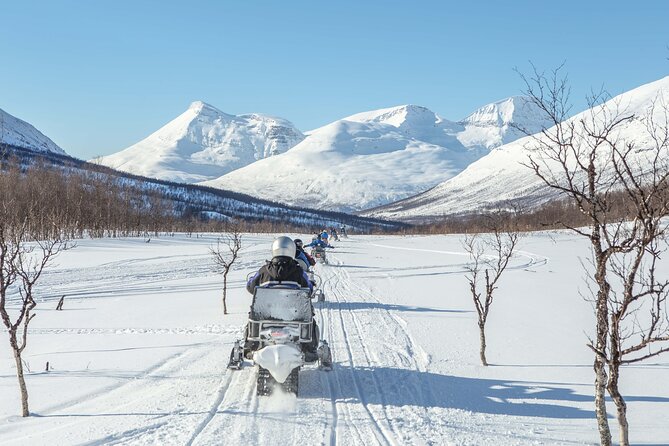Tromsø Snowmobiling, Ice Domes Snow Park, and Reindeer Visit - Warming up in the lavvu
