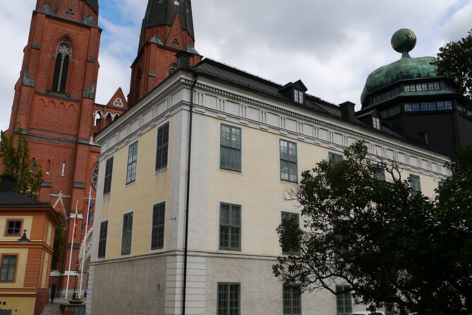 Uppsala's biggest attractions - 1h city walk in Uppsala city. - University House and rune stones: where the tour begins