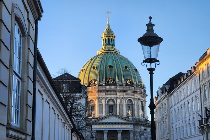Walk & Canal Tour: Copenhagen Highlights + Changing of the Guards - Starting beneath the clock at Central Station